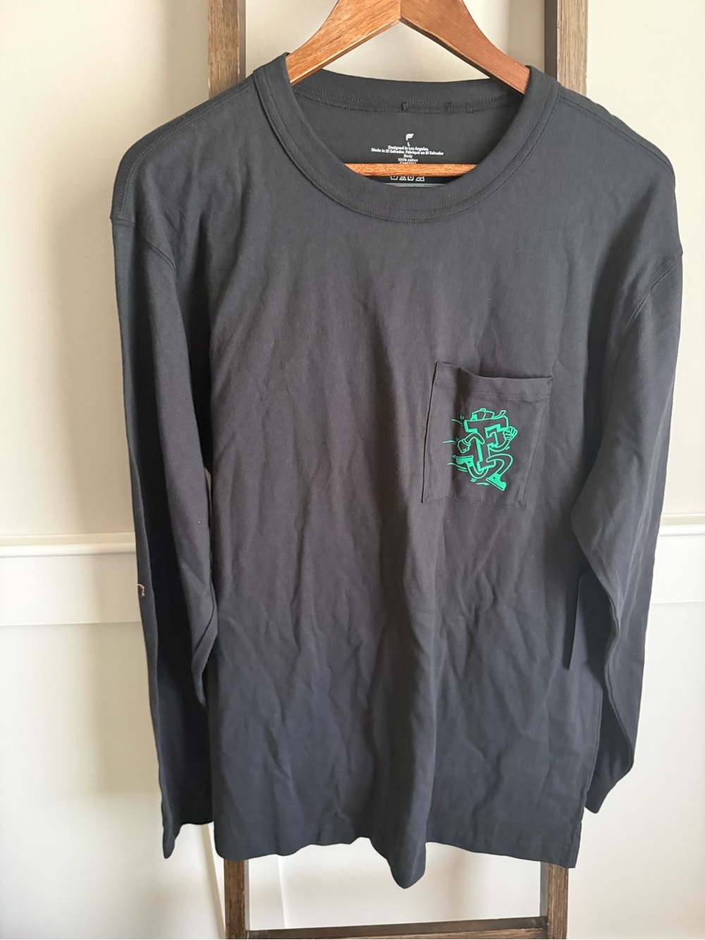 Fabletics Black Long-Sleeve Pocket Tee with Neon Green Chest Graphic